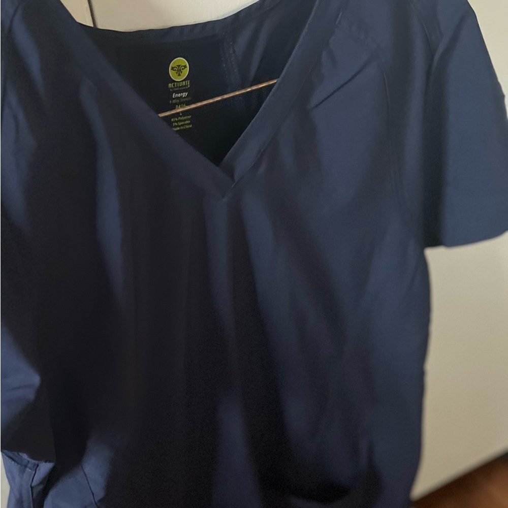 Navy scrub top, stretchy material, almost brand new. Size large